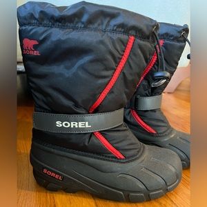 Sorel kids snow boots Size 5 Excellent used condition